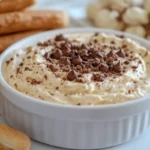 Creamy cookie dough dip served with assorted dippers